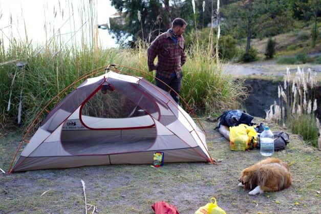 a man setting up his camp