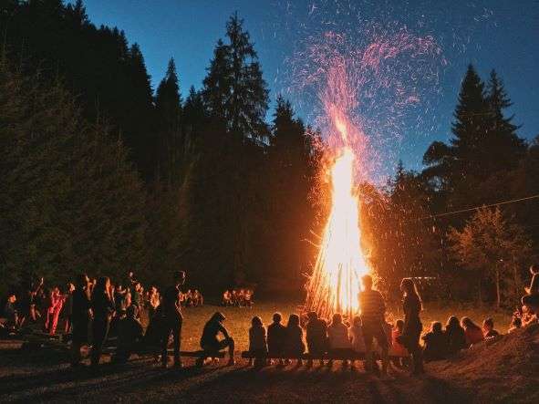 Bonfire campfire people camping in Manali in winters