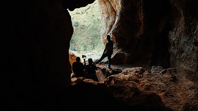 people hiking in Cave of Munits, best adventurous trails in USA