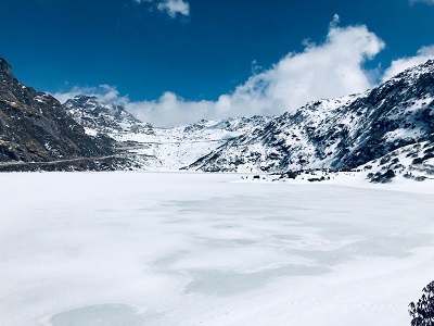 Tourists visiting Nathula pass after reading the Traveler's Guide to the best places to visit in Sikkim