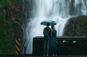 Couples at the waterfall in Munnar