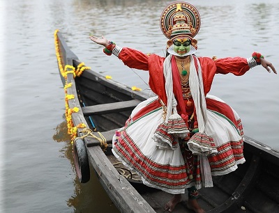 Kathakali dancer in a boat at Munnar