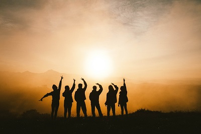 group of friends celebrating their trip in Munnar