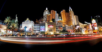 Tourists exploring the Las Vegas strip at night and having fun