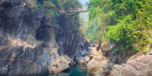 Myor Living Root Bridge, Cherrapunji on the Myor river surroubnded by lush green hills