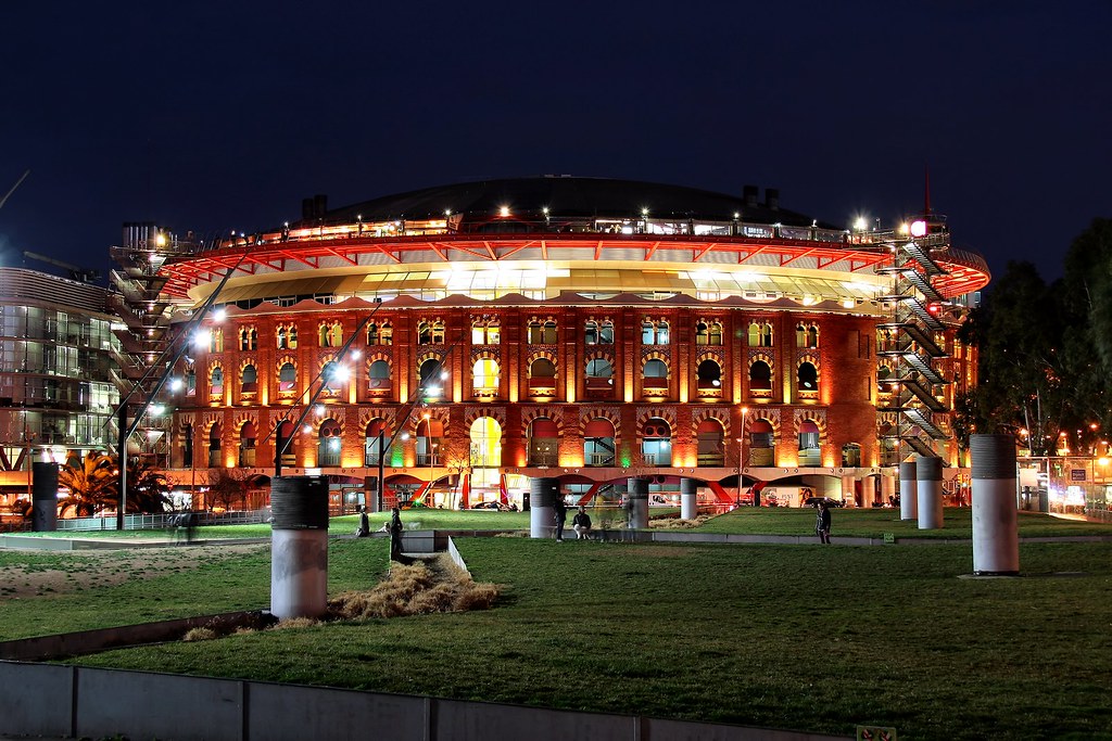 Arenas de Barcelona, illuminated circular building at night in barcelona