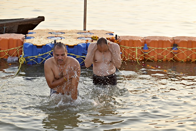 Devotees bathing during Maha Kumbh Mela in prayagraj